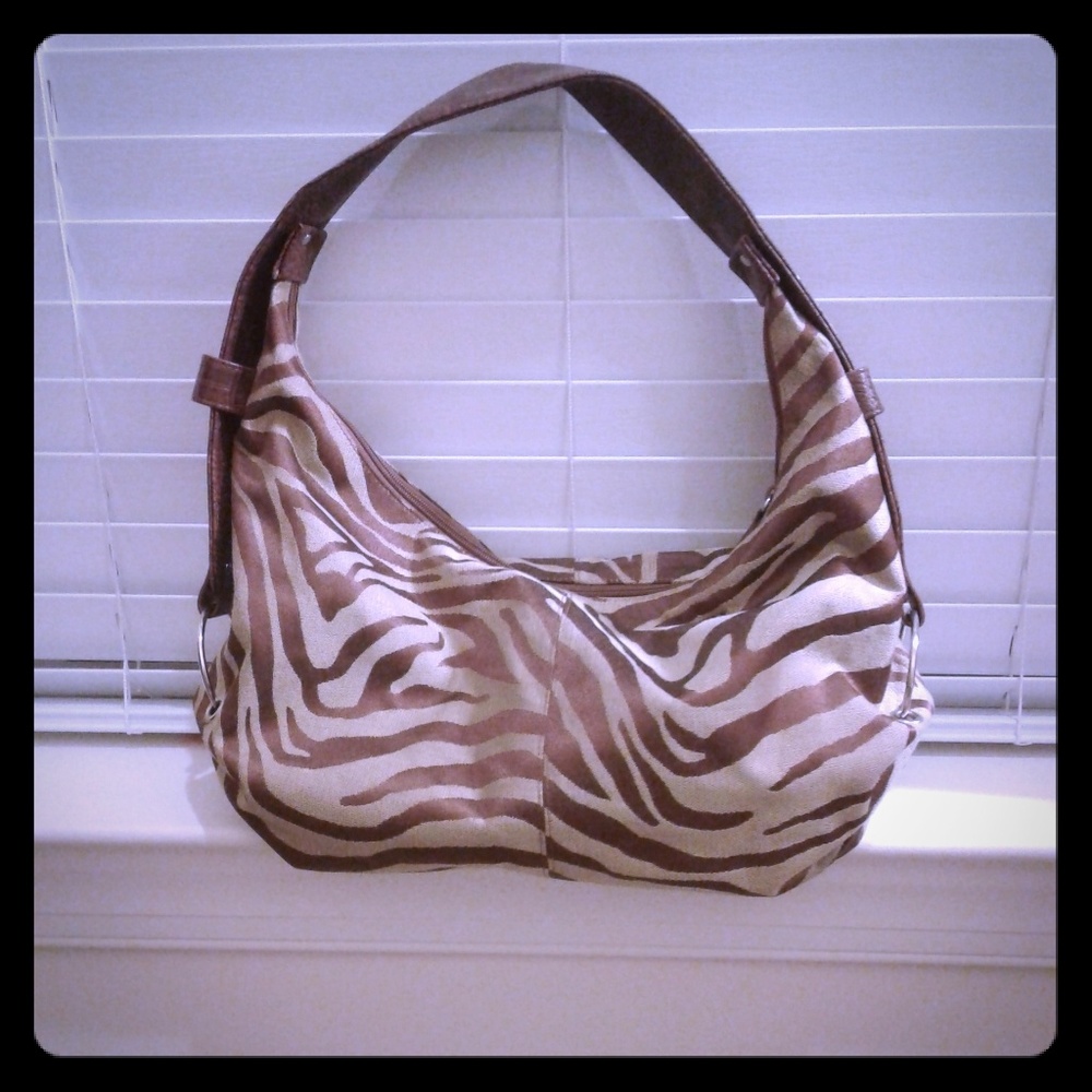 $$$Price Drop$$$ Brown and tan zebra print purrse